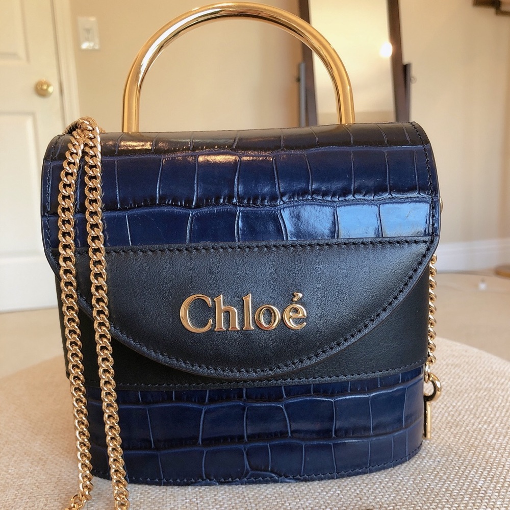Navy blue aby lock chloe new 99% never worn.